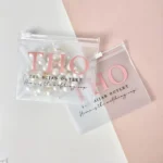 Frosted PVC Jewelry Packing Bag with zip closure used for necklaces and earrings in branded retail packaging