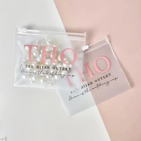 Frosted PVC Jewelry Packing Bag with zip closure used for necklaces and earrings in branded retail packaging