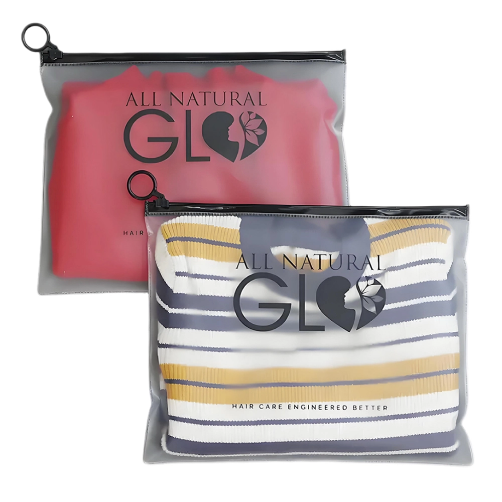 PVC Frosted Zipper Clothing Bag displaying folded garments inside a semi-transparent frosted PVC bag with custom printed logo and zipper closure