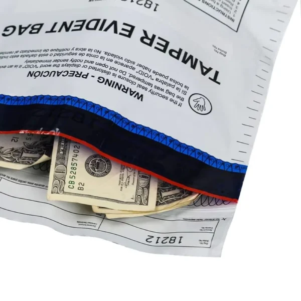 Tamper evident bags containing cash and coins, sealed with visible security tape to prevent unauthorized access.